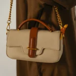 Women's Beige Yolu Top Handle Bag | Canvas Body | Chunky Gold Chain Handle | Tan Leather Trim thumbnail