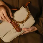 Women's Beige Yolu Top Handle Bag | Canvas Body | Chunky Gold Chain Handle | Tan Leather Trim thumbnail