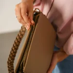Women's Taupe Braided Top Handle Bag | Pebbled Leather with Gold Hardware | Shoulder & Crossbody thumbnail