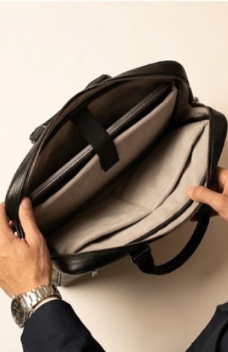Padded laptop compartment fits devices up to 15.6 inches