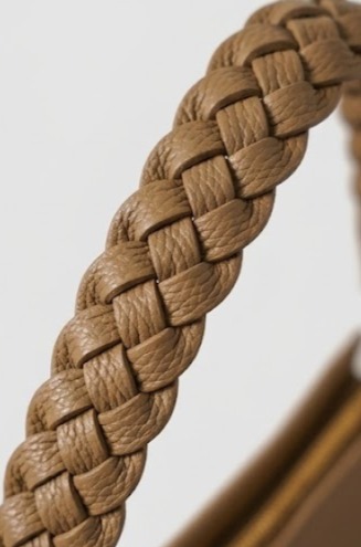 Signature handcrafted braided leather top handle