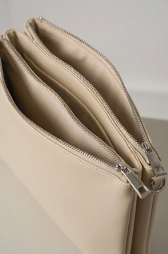 Polished silver hardware clips and zip pulls