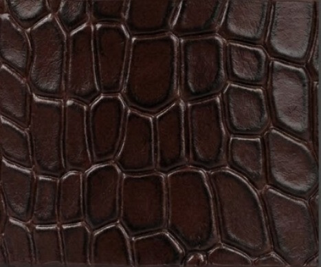 Bold crocodile embossed texture — exotic luxury character